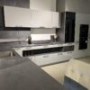 Ex Display Hacker German Pearl Grey – Putty Concrete Graphite – Black Glass Kitchen & Breakfast Bar – Blaupunkt Appliances – Worktops