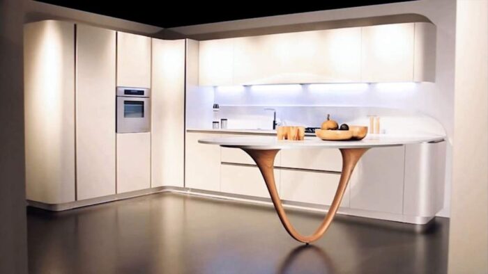 Ex Display Iconic Ola Pininfarina Snaidero Arctic White Titanium Aluminium Finish Kitchen with Natural Pininfarina Design “Boomerang” Curved Worktop With Double Wood Leg Peninsular – Extractor – Ksoul Matt Quartz 20mm Worktop & Half Height Splashback with Pininfarina Design “Boomerang” Curved Worktop With Double Wood Leg.