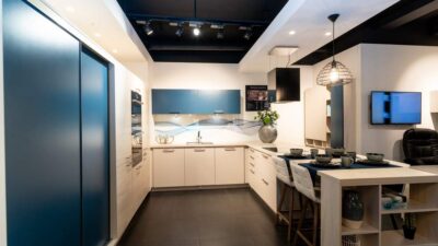 Ex Display Schmidt Arcos in Vison and Slow Wood and Loft Micron in Moody Blue Kitchen with Peninsular – Bosch Appliances - Slow Wood Laminate Worktop