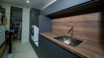 Ex Display Slate Grey Nobilia Utility Room – Kitchenette – Miele Washing Machine – Havana Oak Laminate Worktop and Splash Back