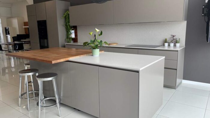 Ex Display Warendorf Luxury Basalt Smooth Lacquer Handleless Kitchen & Island – Miele Appliances - Caesarstone Clamshell and Spekva Classic Walnut Worktops