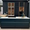 Exhibition Display Nolte Neo Lugano Lack Ash Lacquer Black Handleless Bronze Rail Shaker Kitchen & Island – Bora Siemens 1810 Quooker Appliances – Dekton Morpheus 20mm Porcelain Worktops. With Chalet Oak Breakfast Bar.