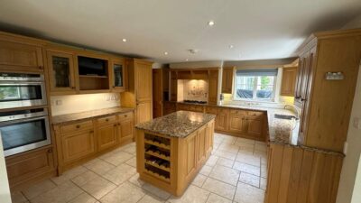 Large Bespoke Wooden Dovetail Joint Kitchen with Island and Utility Room – Neff Appliances – Black and Tan Fleck Granite Worktops