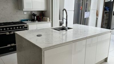 Large Modern White Handleless Kitchen inc Island with Waterfall Sides – Rangemaster Appliance – Marble Effect Granite Worktops