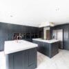 Luxury-Large-Panorama-Shaker-Blue-Kitchen-with-2-Large-Islands-and-Utility-Room-Copper-Handles-Tap-–-Neff-AEG-Quooker-Appliances-–-Corian-Stone-or-Acrylic-Worktops