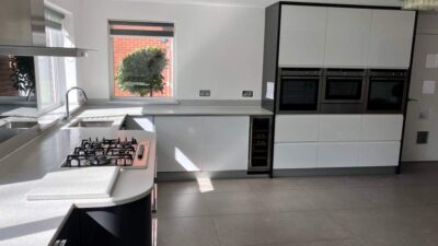 Modern Graphite Grey & White Gloss Kitchen with Utility Room – Neff CDA Appliances – Laminate Worktops
