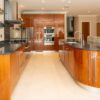 Bespoke Wooden Chrome Handled Kitchen with Large Matching Island & Dining Table including 8 Chairs - Miele Quooker Appliances – Granite Worktops