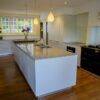 Bulthaup B3 Kaolin White Modern Kitchen with Large Matching Island – Miele Bulthaup Appliances - Silestone kensho. 12mm Worktops Bronze Brown Matt Breakfast Bar