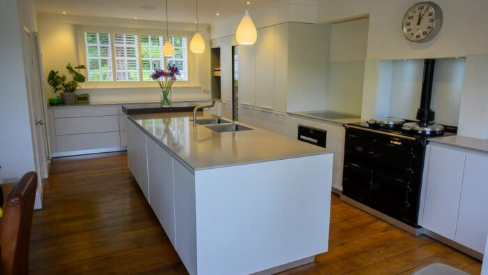 Bulthaup B3 Kaolin White Modern Kitchen with Large Matching Island – Miele Bulthaup Appliances - Silestone kensho. 12mm Worktops Bronze Brown Matt Breakfast Bar