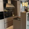 Ex Display Luxury Italian Iconic Snaidero Frame Burnished Gold Micalised with Titatnium Profiles Glass Kitchen & Island – Smeg Snaidero Quooker Appliances - Granite Cormic Black Worktops