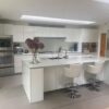 Large Luxury Poggenpohl Modern White Gloss Handless Kitchen & Large Island with Matching Utility Room – Gaggenau Miele Appliances – White Stone Worktops