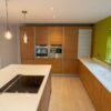 Luxury Poggenpohl Beech Wood Handleless Kitchen and Matching Island – Neff Appliances – Corian Worktops