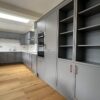 Modern Graphite Grey Coppertone Handled Kitchen with Peninsula – Neff AEG Bosch Appliances – White Quartz Worktops