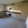 New-Unused-Symphony-Sage-Green-Modern-Shaker-Kitchen-–-Indesit-Appliances-–-Laminate-Worktops