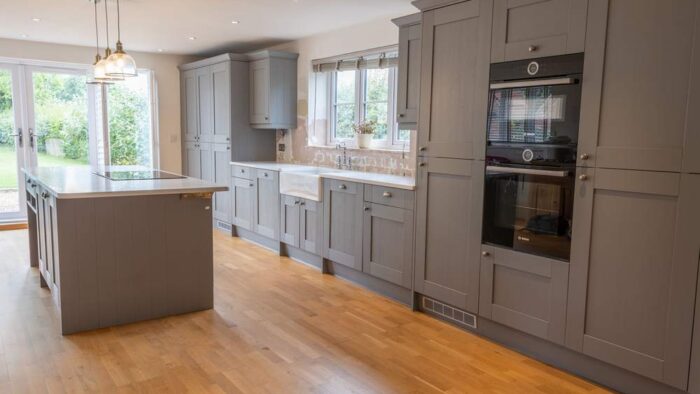 Wren Dusk Grey Shaker Kitchen including Matching Island with Breakfast Bar– AEG Bosch CDA Appliances – White Quartz Worktop