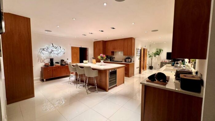 Chamber Furniture Dove Tail Joint Book Matched Wood Kitchen with Large Island and Utility Room – Wolf Miele Liebherr Appliances - Quartz Worktops