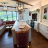 Ex Display Mereway Traditional Inframe Painted Pale Grey Kitchen & Castle Grey Island with Integrated Bench Seating Area plus Overhead Pan Rack – Neff Dishwasher – Tahiti White Imperial Quartz Worktops Walnut Butchers Block