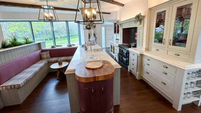 Ex Display Mereway Traditional Inframe Painted Pale Grey Kitchen & Castle Grey Island with Integrated Bench Seating Area plus Overhead Pan Rack – Neff Dishwasher – Tahiti White Imperial Quartz Worktops Walnut Butchers Block