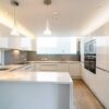 Luxury Nolte Handleless White Kitchen inc Peninsula – Neff Siemens Liebherr Appliances – White Quartz Worktops