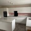 Gloss White Handleless Soft Close Kitchen with Island and Utility Room – Neff Electrolux appliances – Quartz Worktops