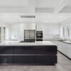 Rotpunkt Gloss White Handleless Kitchen with Large Island – Siemens Bosch Quooker Appliances – Quartz Worktops