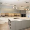 Wren Infinity Linea Ash Grey & White Handleless Kitchen with Large Island - Neff Samsung Appliances - Terrazzo White Laminate Worktops