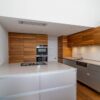 Luxury Bulthaup Aluminium and Walnut Handleless Kitchen with Peninsula -Gaggenau Siemens Miele Appliances - Caesarstone Worktops