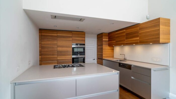 Luxury Bulthaup Aluminium and Walnut Handleless Kitchen with Peninsula -Gaggenau Siemens Miele Appliances - Caesarstone Worktops