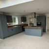 Unused Symphony Princeton in Providence Blue Shaker Kitchen including Island with Breakfast Bar and Utility Room – Zanussi Appliances – Laminate Worktops