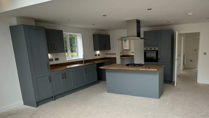 Unused Symphony Princeton in Providence Blue Shaker Kitchen including Island with Breakfast Bar and Utility Room – Zanussi Appliances – Laminate Worktops