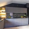 Ex Display Hacker Systemat Black Green & Greige Velvet Grey Oak Kitchen with Pocket Door Coffee Station – Blaupunkt Appliances - Marazzi 12mm Marble Effect Grigio Carinco Worktops – 3832749