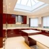 Modern Large Ruby Red Gloss Chrome Handled Kitchen with Peninsula - Miele Appliances – Quartz Worktops