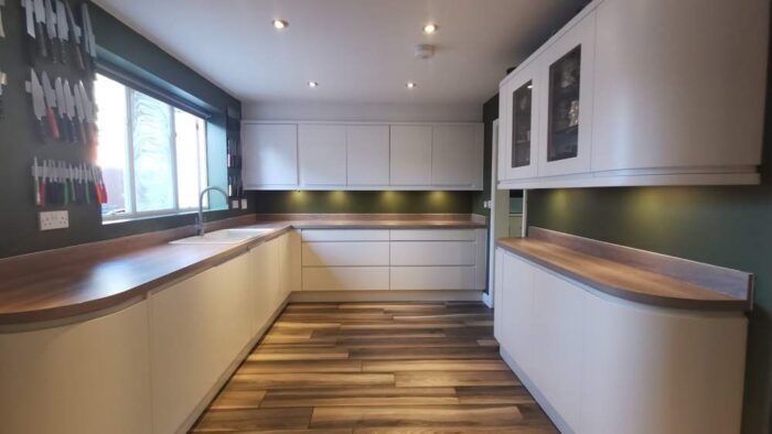 Wren Buttercream & White J Handled Kitchen and Island– Neff Hoover Appliances – Laminate Worktops