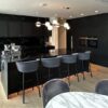 Bespoke Modern Black with Brass Handled Kitchen and Large Matching Island – Siemens Liebherr Appliances – Black Marble Effect Granite Worktops