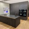 Extra Large Luxury Exhibition Grand Design Leicht Primo Acrylic Pearlescent Kitchen with Matching Utility Room - Pantry - Tall Bookshelf Display – Neff Blanco Appliances - Silestone Quartz Bohemian Flame & Fossil Grey Worktops