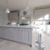 John Lewis of Hungerford Dove Tale (F&B) Dove Tail Shaker Kitchen with Matching Island – Rangemaster Neff Bosch – Quartz Worktops