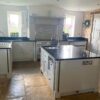 Bespoke Dove Grey Dovetail Joint Shaker Kitchen with Matching Island – Brittania Sharp Appliances – Black Granite Worktops