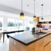 Rotpunkt & Bespoke Wood Look and White Chrome Handled Kitchen and Matching Rotpunkt Island – Miele Neff Liebherr Appliances – Caesarstone Worktops