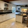 Bespoke Buttercream Dovetail Joint Kitchen with Matching Island and Semi Circle Bench Seating – Granite Worktops