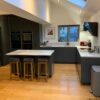 Bespoke John Lewis Moderna Handleless Diamond Grey Kitchen and Matching Island with Breakfast Bar – Neff Elica Frankie Appliances - Minerva Quartz Worktops