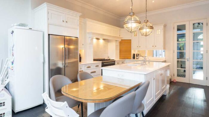 Luxury Mark Wilkinson Traditional White Etruscan Door Kitchen matching Island with Tall Double Butler Pantry – Britannia Mark Wilkinson Neff Amana Appliances - Bullnose White Granite Worktops & Table