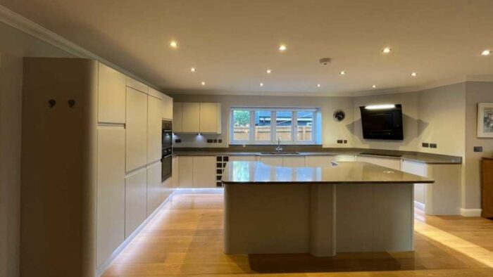 Magnet Stone Grey J Handled Kitchen with Large Matching Island – AEG Neff Beko Appliances – Grey Flecked Quartz Worktops