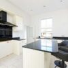 Magnet-Cream-Shaker-Kitchen-and-Matching-Island-with-Breakfast-Bar-–-Rangemaster-Caple-Appliances-–-Black-Granite-Worktops-383003
