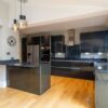 Graphite Grey Gloss Modern Slab Kitchen and Peninsula with Breakfast Bar – Bosch Samsung Appliances – Granite Worktops