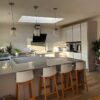 Luxe Stone Grey Modern Slab Kitchen and Peninsula with Waterfall Side – Siemens Appliances – Quartz Worktops – 3833048