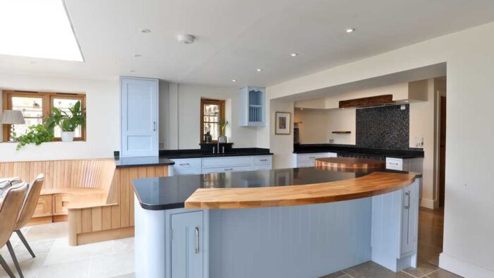 Luxury Edwin Loxley Duck Egg Blue Dovetail Joint Shaker Kitchen with Island and Wooden Bench – Neff Rangemaster Fisher Paykel Appliances – Granite & Wooden Worktops