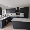 Young Navy-Blue Shaker Kitchen and Matching Island with Breakfast Bar – Prima Appliances – Quartz Worktops