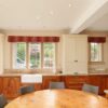 Bespoke Large Dovetail Joint Cream and Walnut Kitchen with Large Island and Dining Table - Falcon Siemens Appliances – Granite Worktops