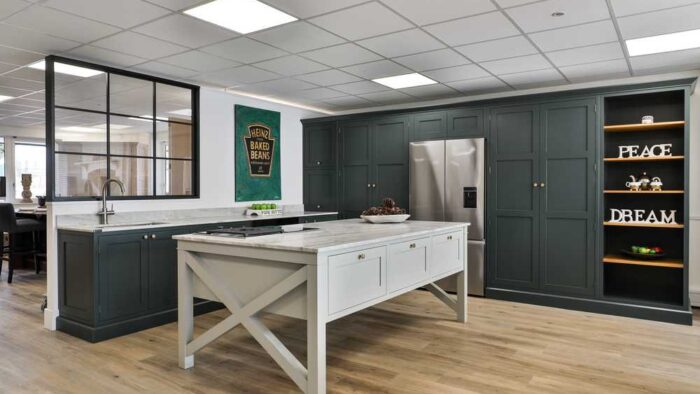 Ex Display Finsa Hydrifugo In Frame Studio Green & Tulip Wood Dovetail Joint Shaker Kitchen with Hardwick White Island - Wolf Fisher & Paykel Grohe Appliances - Cosentino Vancouver Worktops