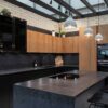 Ex-Display Hacker Premium Style Handleless Matt Black Lacquer & Nougat Wild Oak Kitchen with Island – Bora Neff Siemens Appliances – Caesarstone Darcrest Quartz (20mm) Worktops
